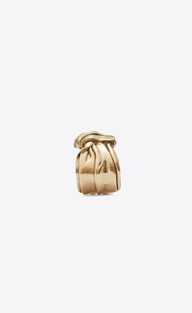 Draped bow cuff bracelet in light gold metal